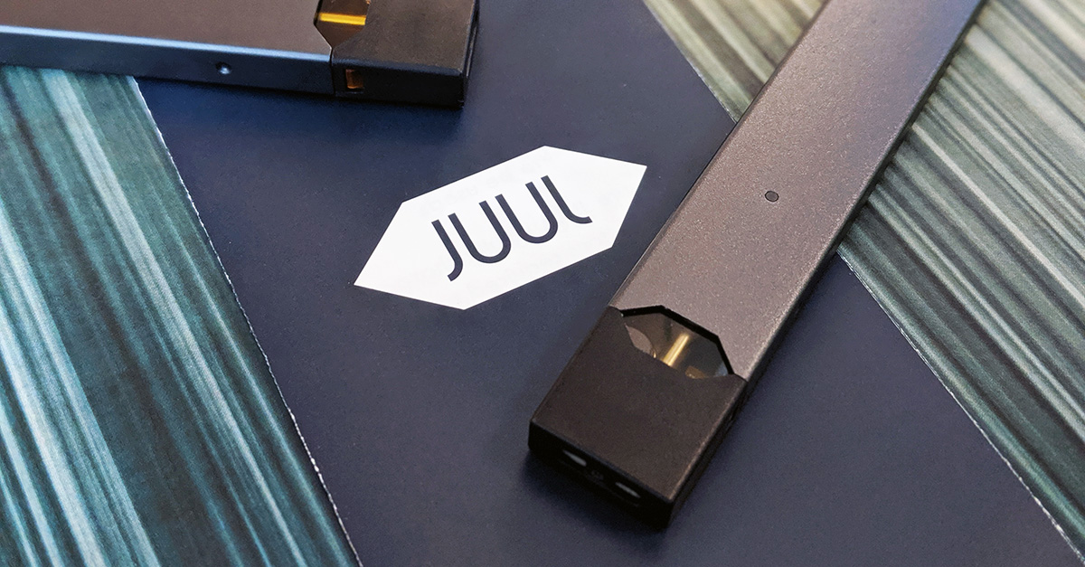 A JUUL on the JUUL Logo
