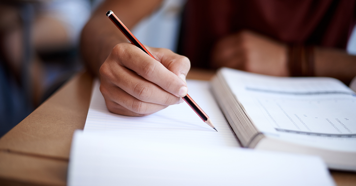 Student doing schoolwork at a desk