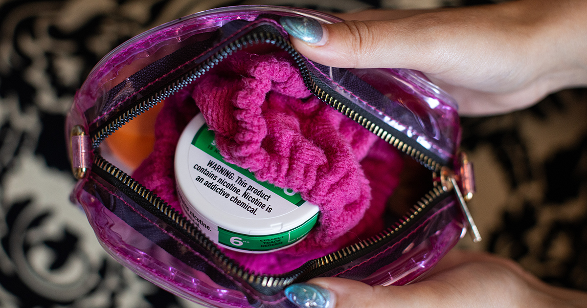 Nicotine Pouch in a purse