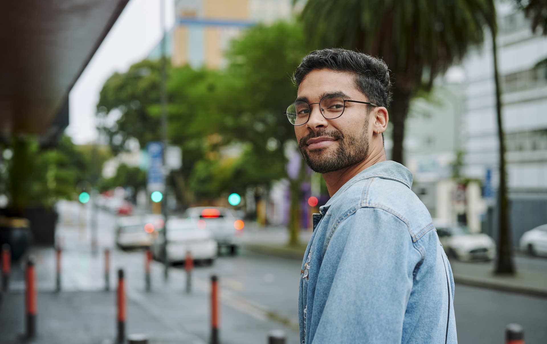 Young man smiling while walking