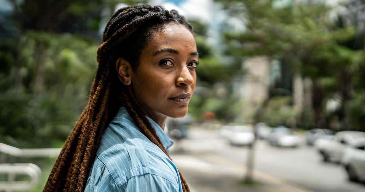Woman on the street looking concerned