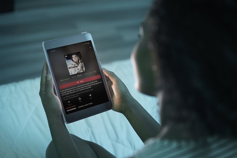 Woman watching streaming content on a tablet