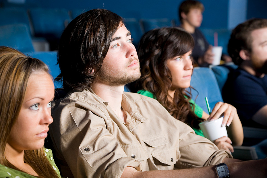 Young people watching a movie