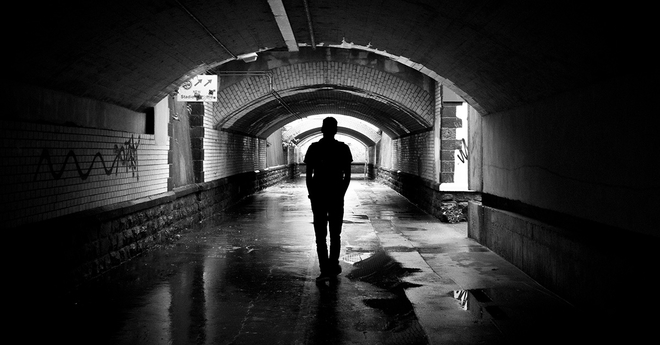 Homeless person in tunnel