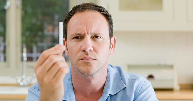 Man Holding Cigarette