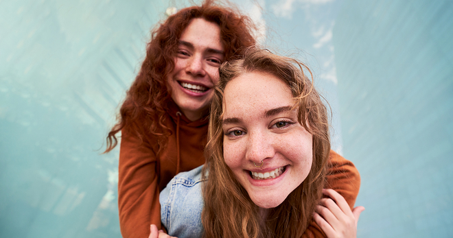Two girls smiling