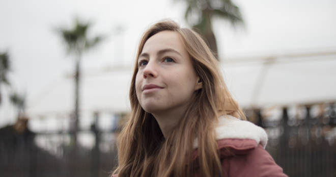 Girl looking wistful outside