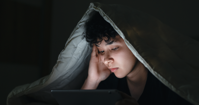 A person experiencing trouble sleeping