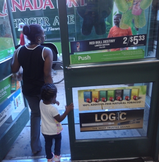 Retailer door with ads