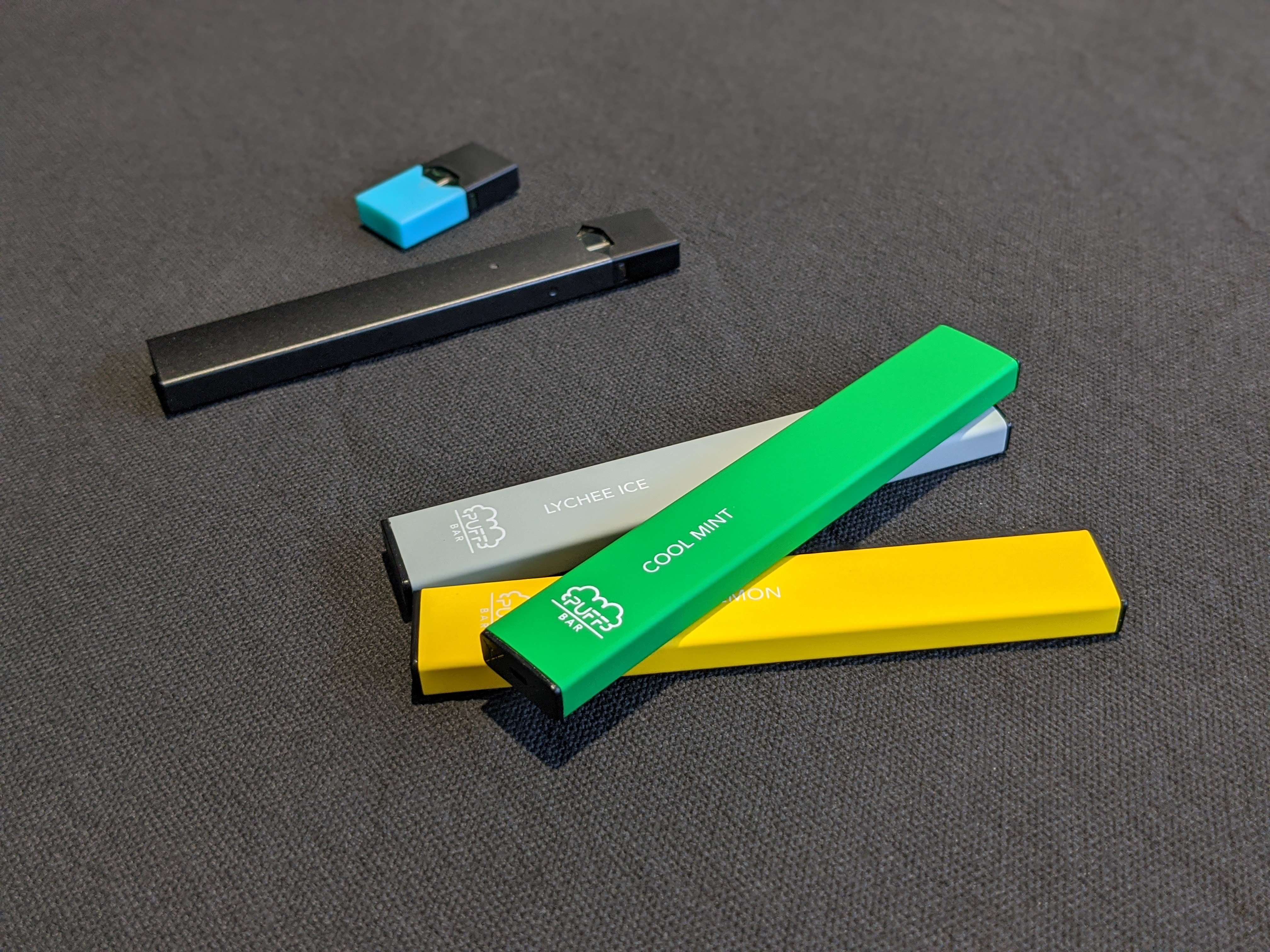 JUUL e-cigarette and pod with Puff Bars